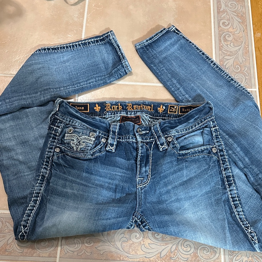 Rock Revival Distressed Blue Jeans with Embellished Pockets